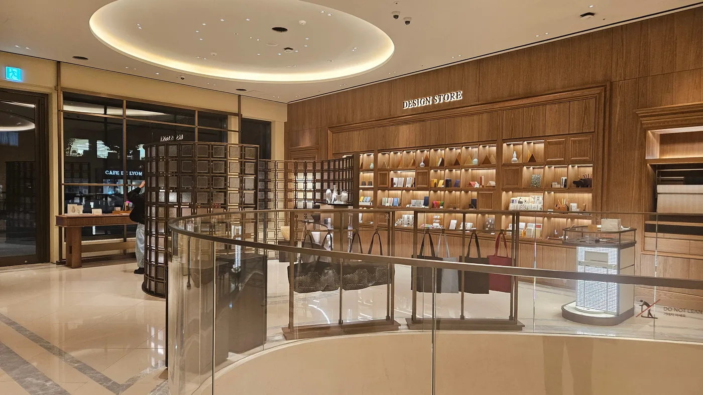 The Shinsegae Namsan Design Store, with shelves of goods and tote bags on display